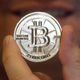 A metal token representing a bitcoin. File photo.